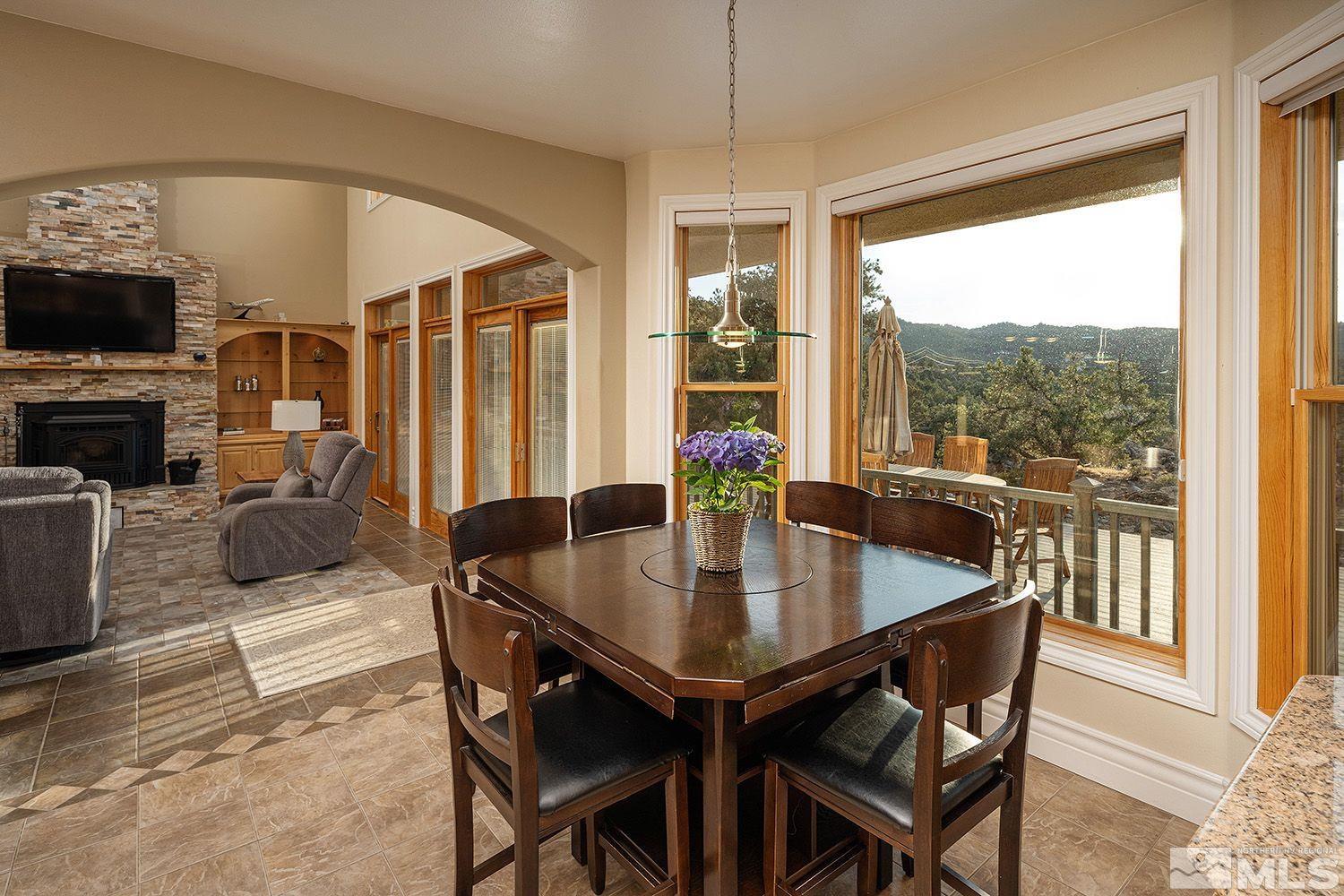 4530 Lousetown Road Reno, NV 89521 - Photo 10 of 39 a view of a dining room with furniture window and outside view