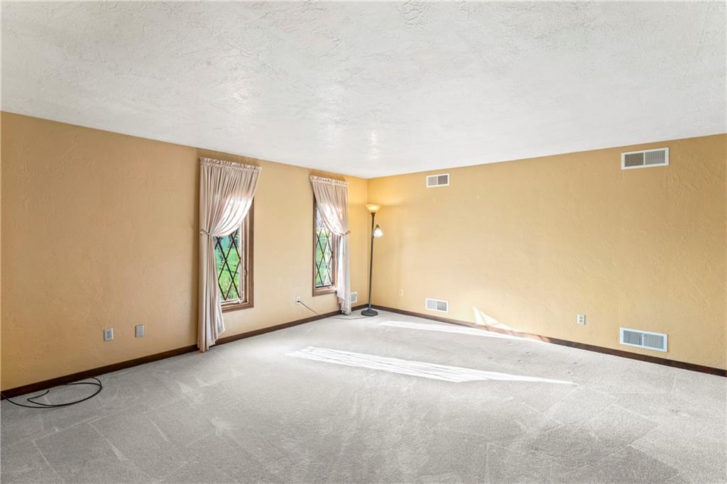 224 County Line Road Bridgeville, PA 15017 - Photo 7 of 25 a view of an empty room with a window