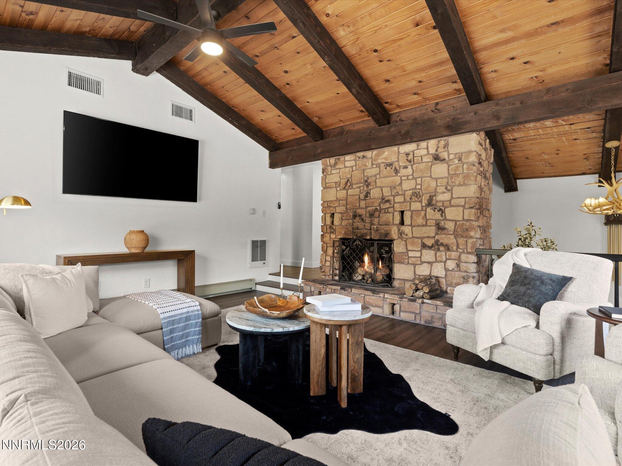 20449 Temelec Way Reno, NV 89521 - Photo 14 of 65 a living room with furniture and a fireplace