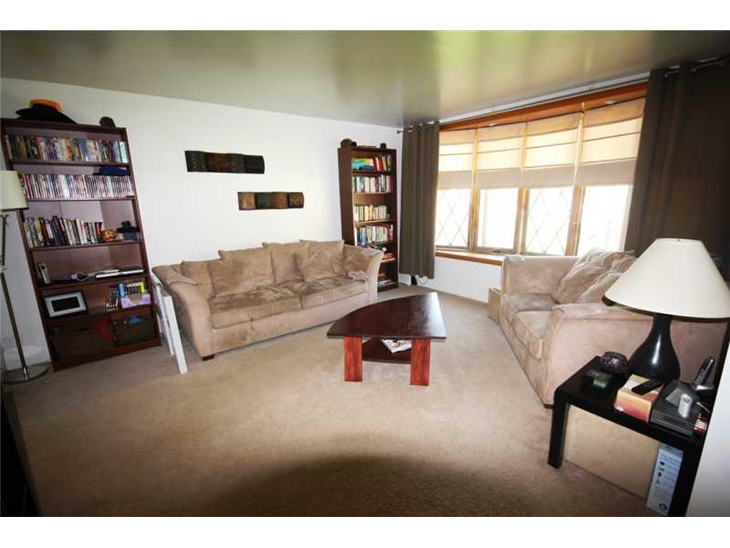5 Walkers Mill Road Carnegie, PA 15106 - Photo 3 of 25 Living Room. The comfortable Living Room is bright and neutral.