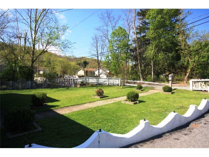 5 Walkers Mill Road Carnegie, PA 15106 - Photo 23 of 25 Yard/Garden. The cute Front Yard with a White Picket Fence. Walk across the street to join the Panhandle of the Montour Trail.