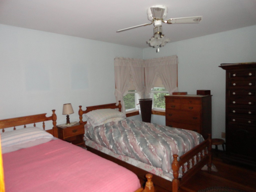 24 Warren Road Townsend, MA 01469 - Photo 11 of 15 a bedroom with two beds and painted walls