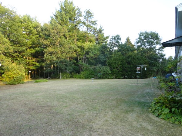 24 Warren Road Townsend, MA 01469 - Photo 15 of 15 a view of a field with trees in the background