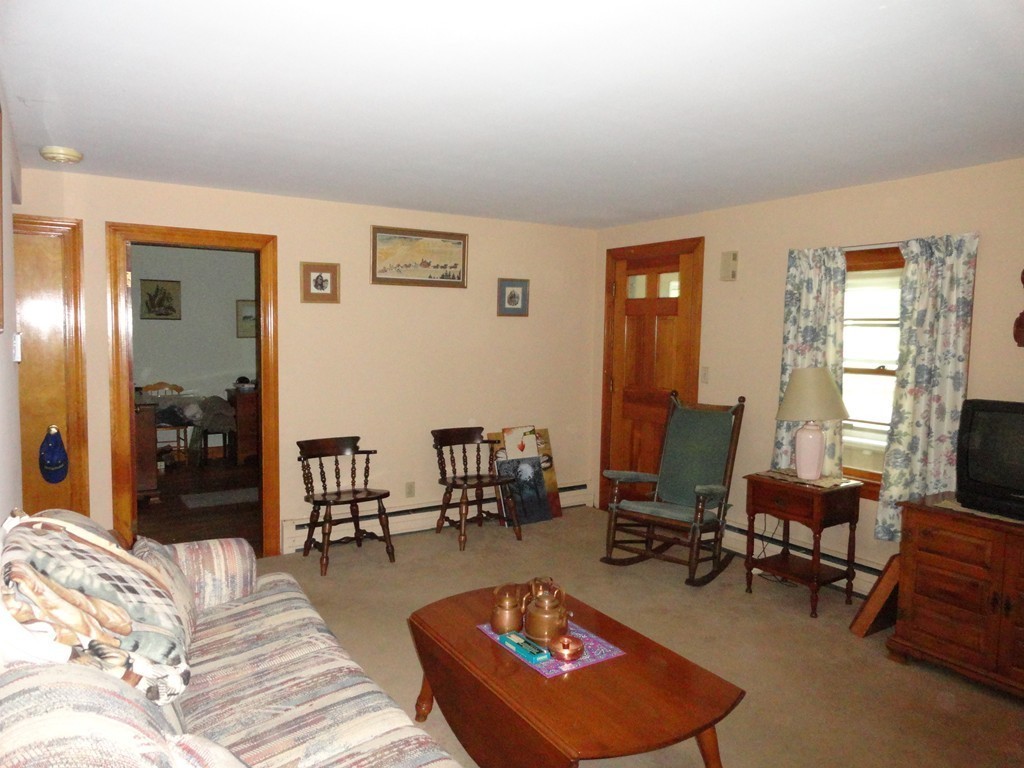24 Warren Road Townsend, MA 01469 - Photo 6 of 15 a living room with furniture rug and window
