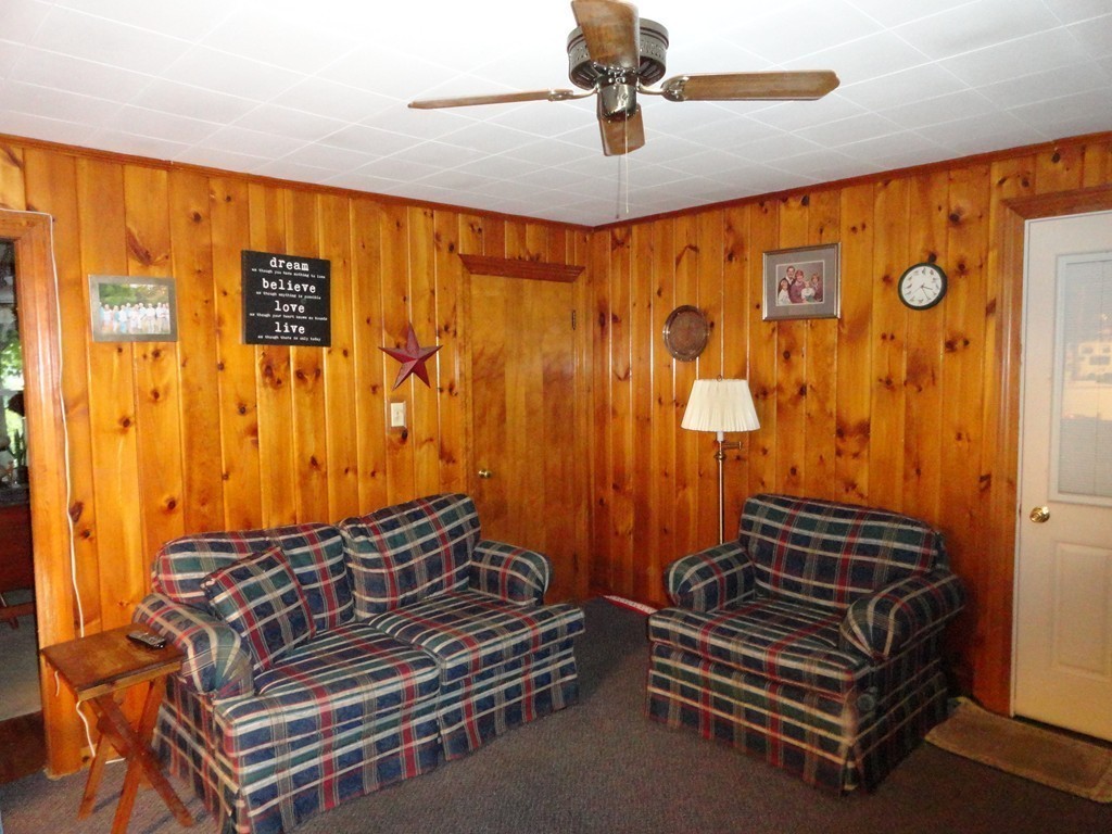 24 Warren Road Townsend, MA 01469 - Photo 7 of 15 a view of room with stairs and a chandelier