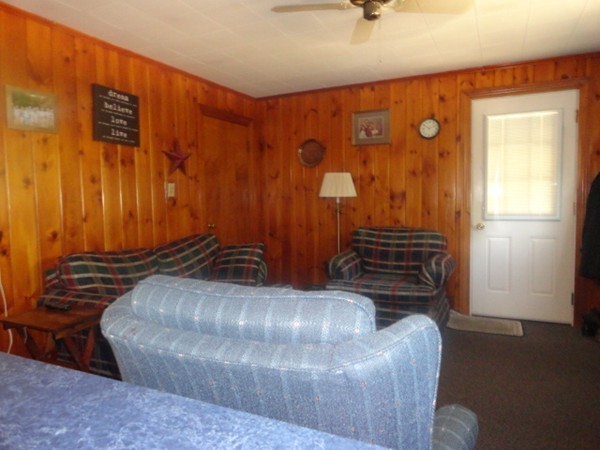 24 Warren Road Townsend, MA 01469 - Photo 8 of 15 a bedroom with a bed and wooden floor
