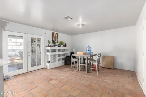 a living room with furniture and a couch