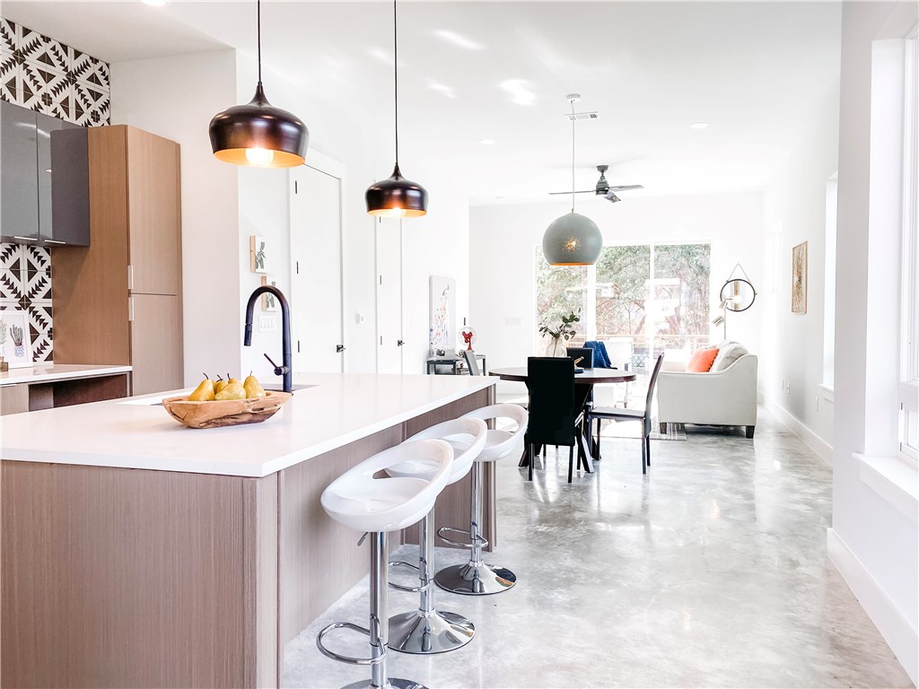 a very nice looking dining room with a table and chairs