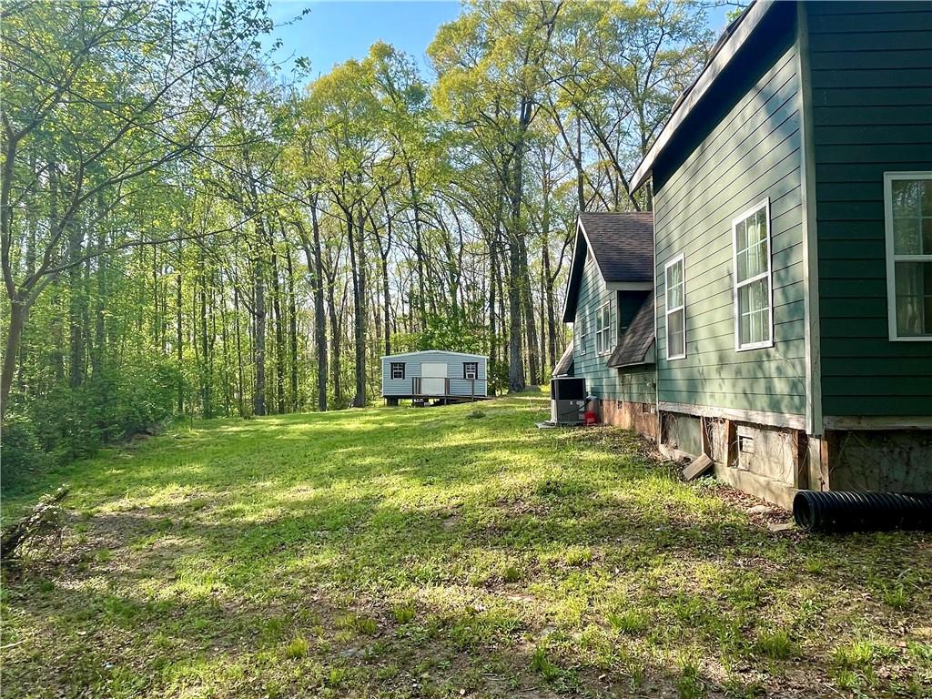 12005 A Hutchesons Ferry Road Palmetto, GA 30268 - Photo 6 of 53 a view of a back yard