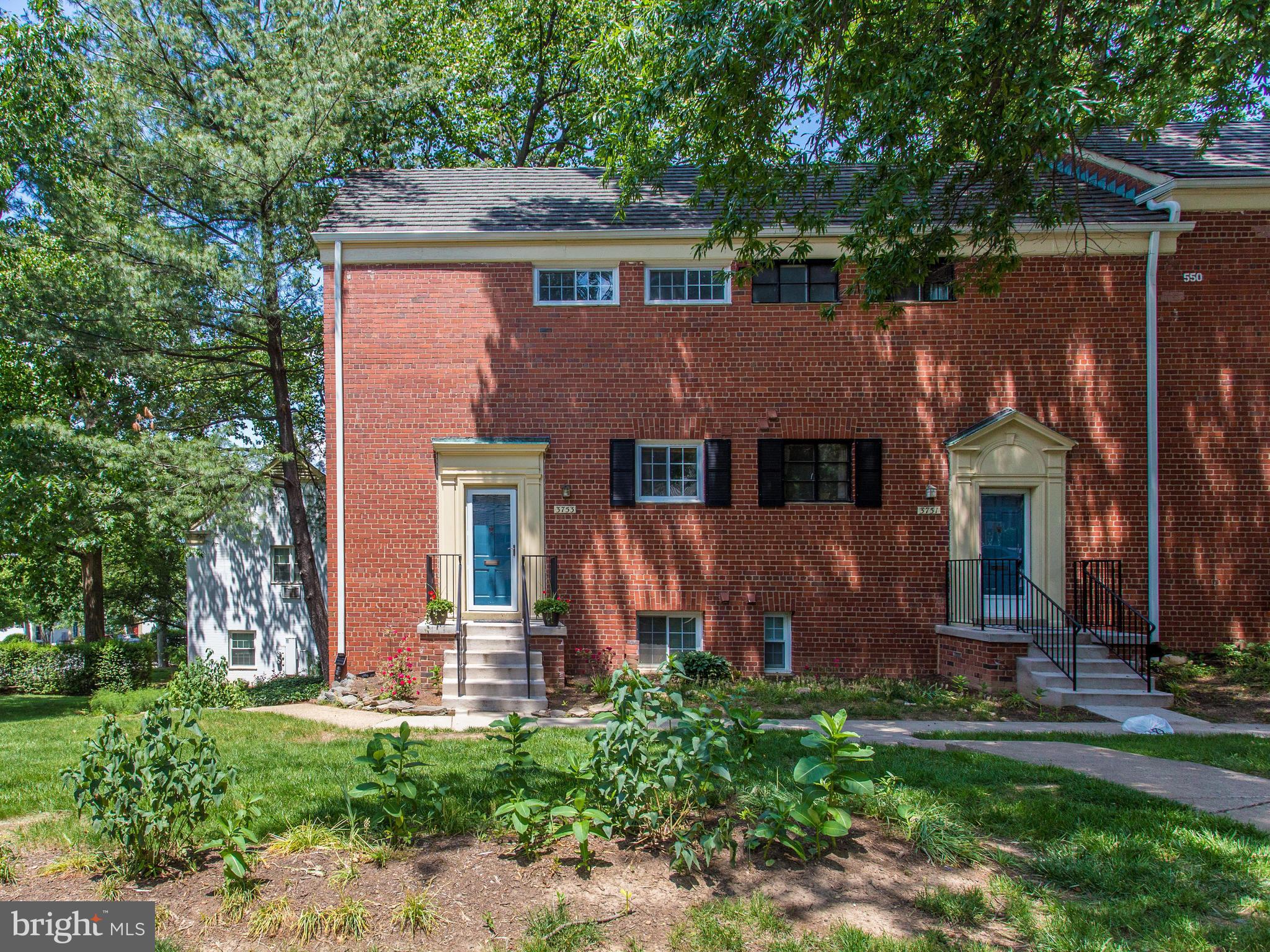 3753 Gunston Road Alexandria, VA 22302 - Photo 1 of 17 front view of a house with a yard