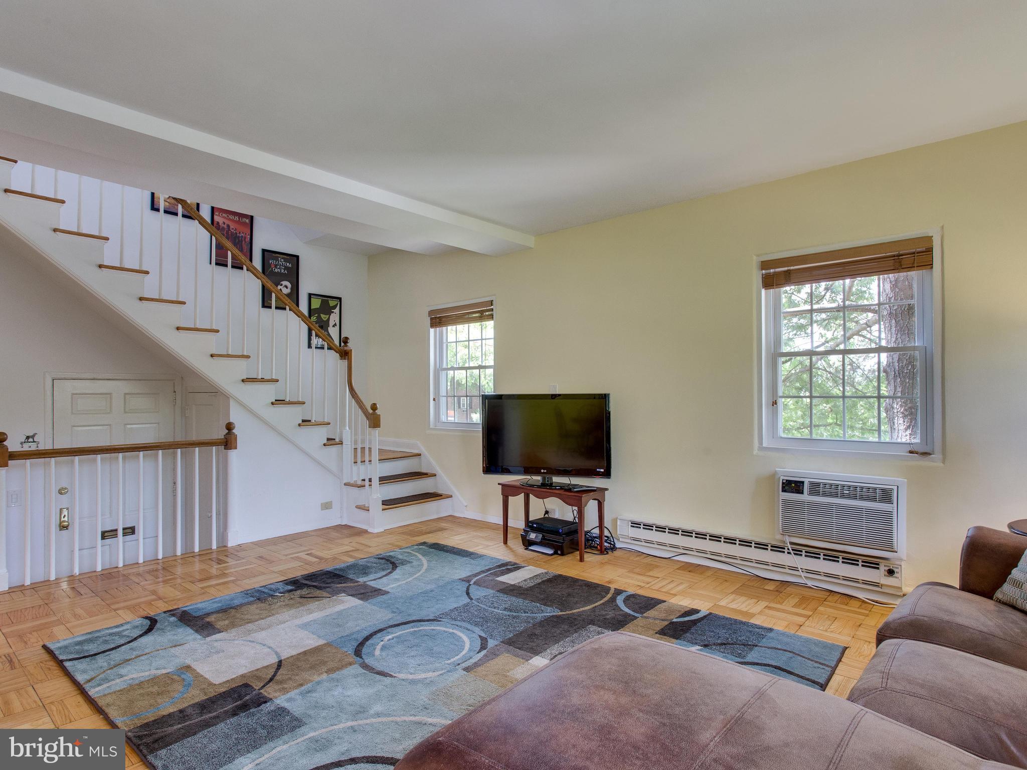 3753 Gunston Road Alexandria, VA 22302 - Photo 8 of 17 a living room with furniture and a flat screen tv