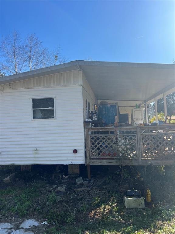 118 Creekside Road Satsuma, FL 32189 - Photo 28 of 31 a view of a back yard of the house