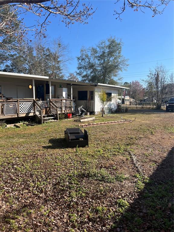 118 Creekside Road Satsuma, FL 32189 - Photo 10 of 31 a view of a house with backyard