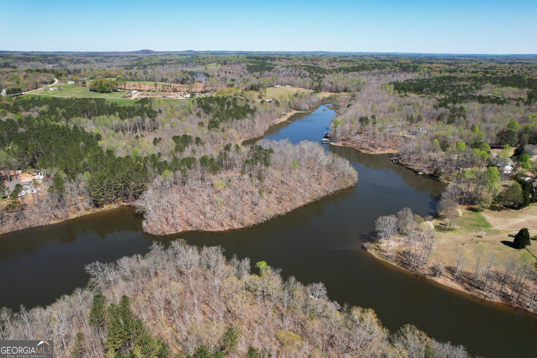0 Center Point Road, Unit TR 3 Carrollton, GA 30117 - Photo 11 of 11 a view of a lake with a mountain in the background