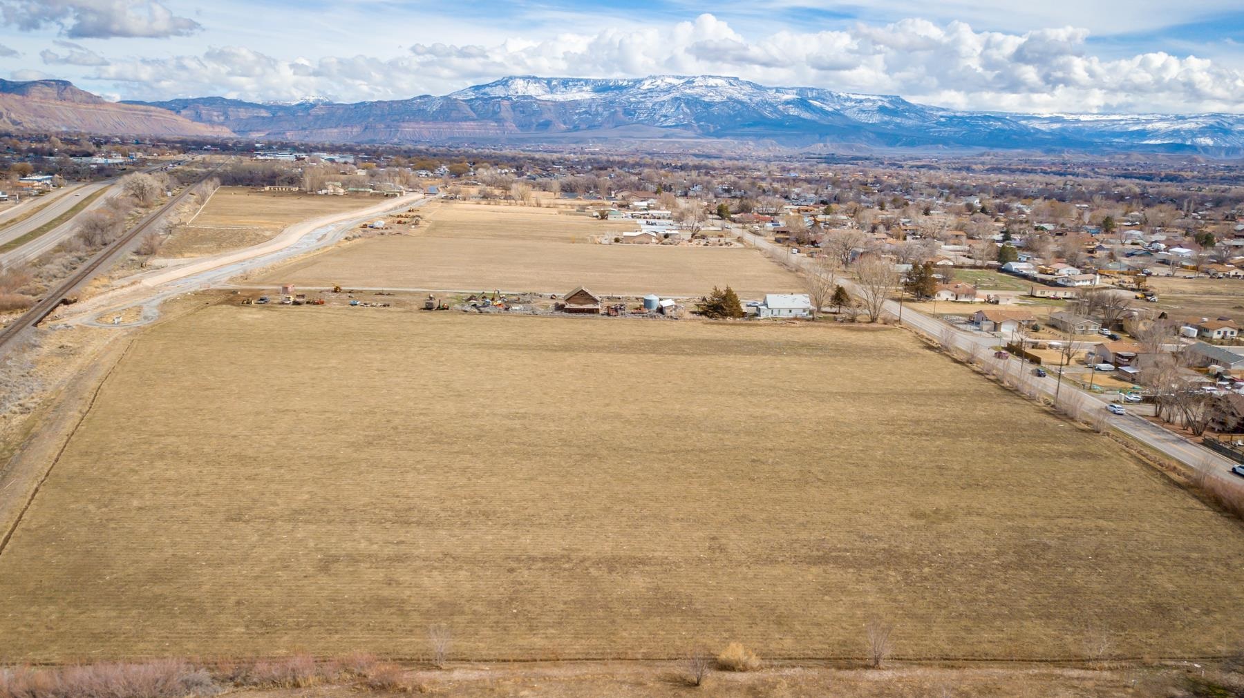 3062 E Road Grand Junction, CO 81504 - Photo 2 of 19 a view of an ocean and a mountain