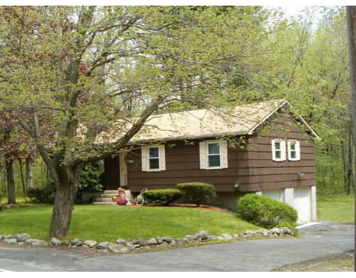 227 Three Rivers Road Wilbraham, MA 01095 - Photo 2 of 3 a front view of a house with a yard