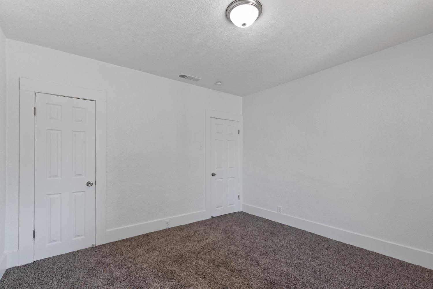 3321 East Montecito Avenue Fresno, CA 93702 - Photo 12 of 22 a view of an empty room