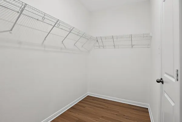 a view of a room with racks on the wall