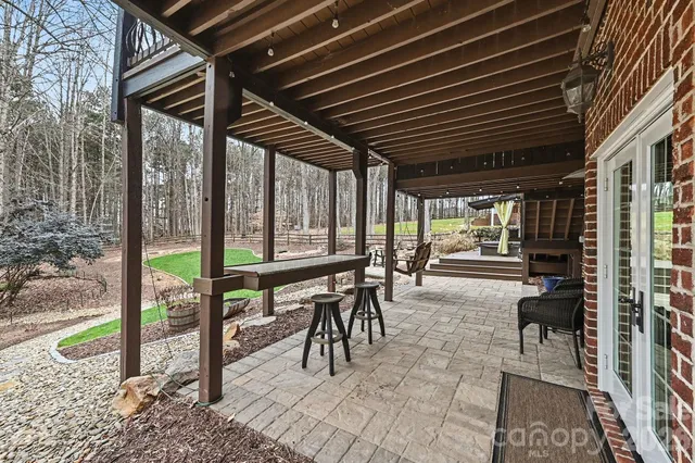 a view of a porch with furniture