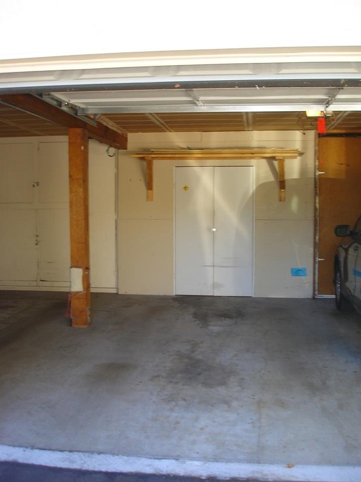 9060 Fanita Rancho Road Santee, CA 92071 - Photo 22 of 25 Garage with Storage. 2nd Reserved Parking Spot located at spot picture is taken.