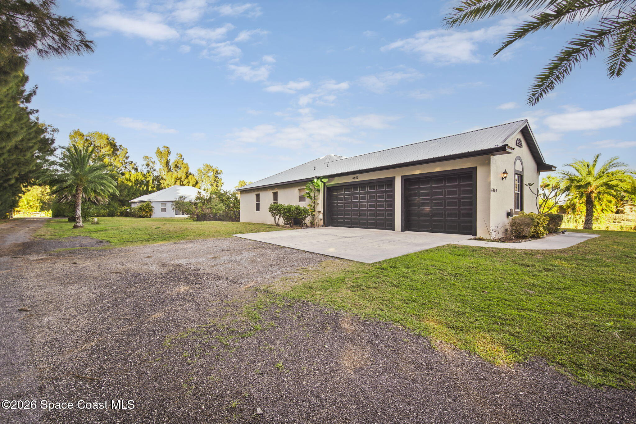 6800 McGruder Road Merritt Island, FL 32953 - Photo 3 of 31 3-web-or-mls-MCGRUDER_FRONT6