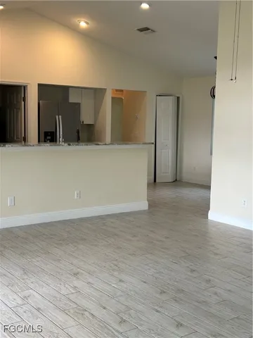 a view of a big room with wooden floor