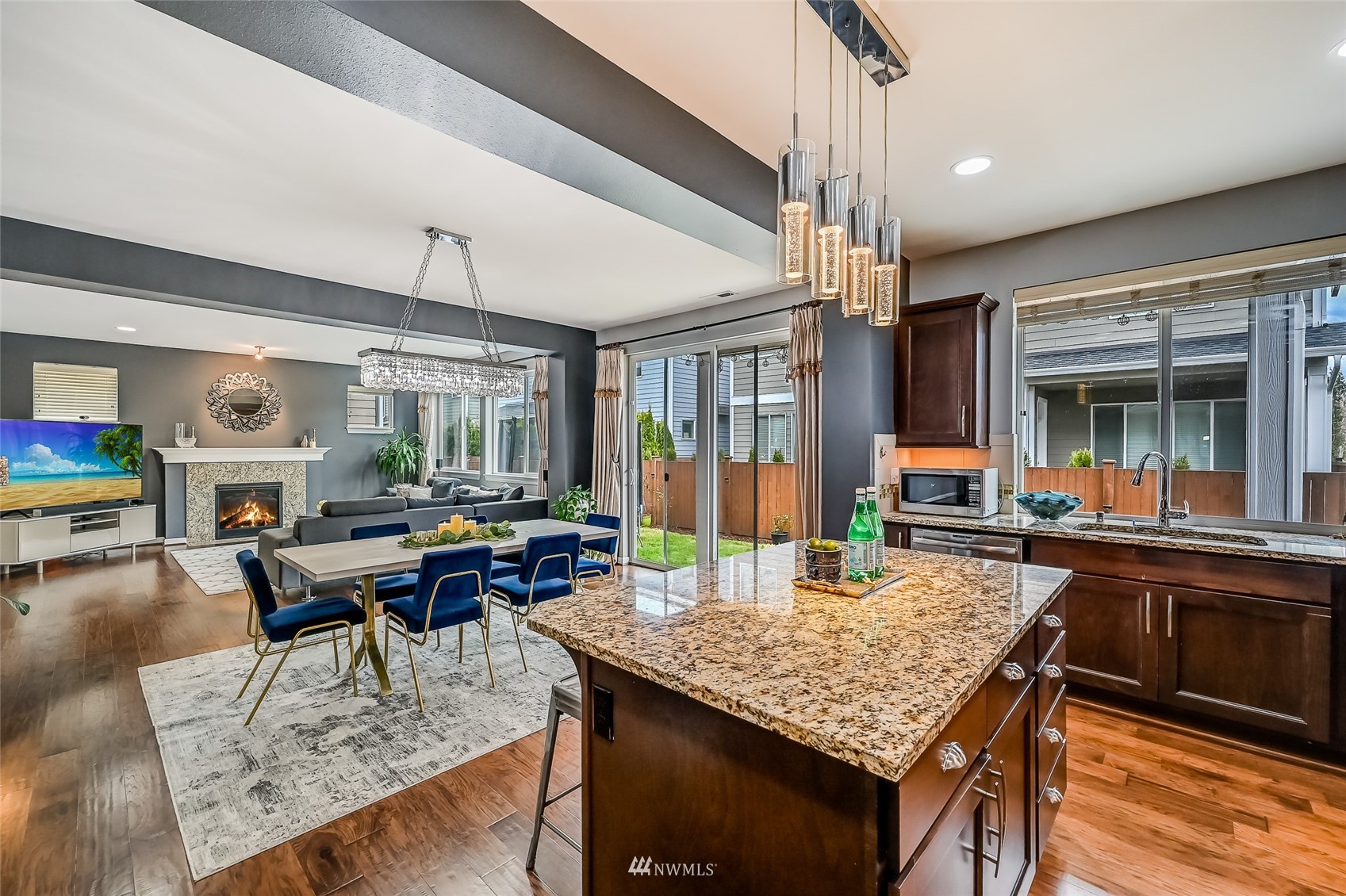 3715 195th Place Southeast Bothell, WA 98012 - Photo 12 of 28 a kitchen with a table and chairs in it