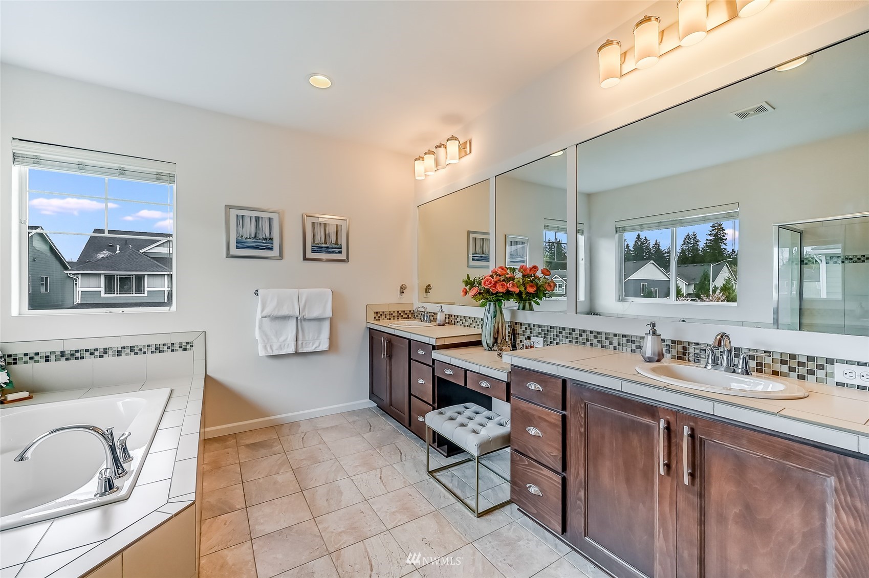 3715 195th Place Southeast Bothell, WA 98012 - Photo 20 of 28 a spacious bathroom with a sink a mirror and a bathtub