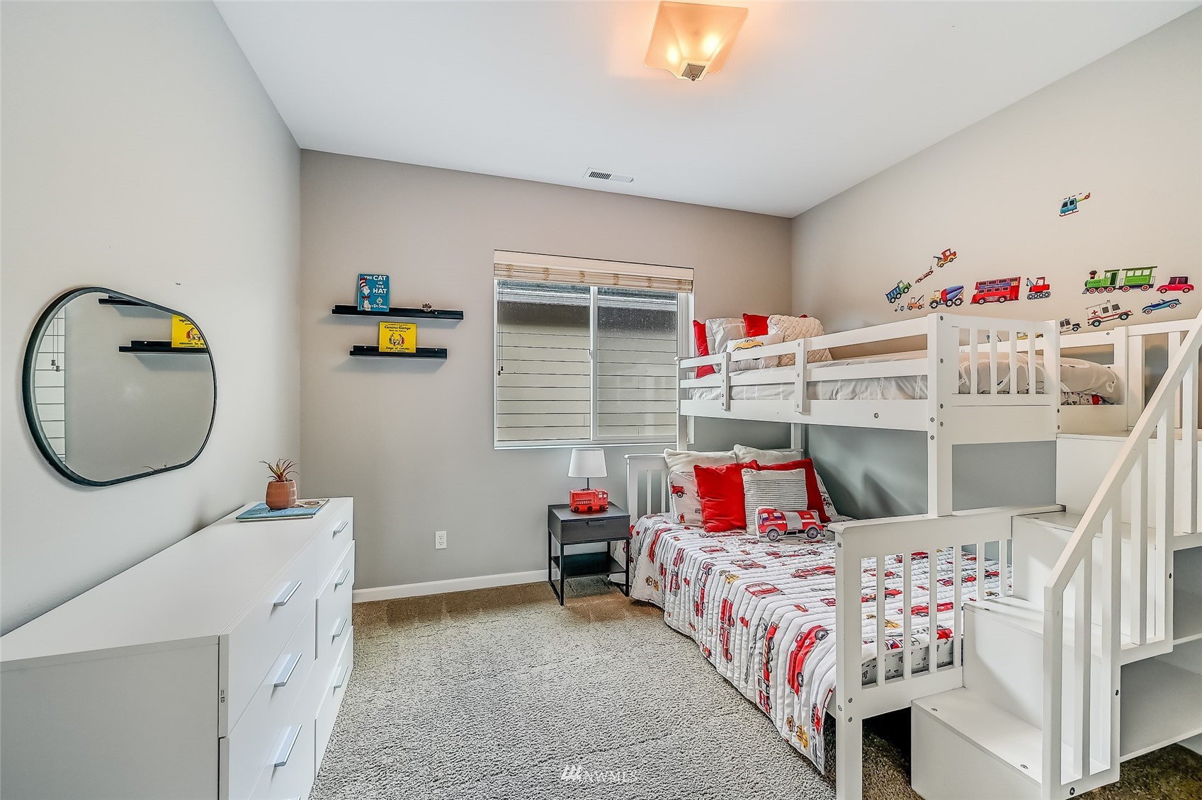 3715 195th Place Southeast Bothell, WA 98012 - Photo 24 of 28 a bedroom with a bed and a chandelier