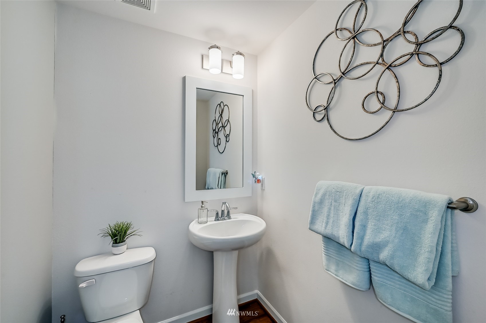 3715 195th Place Southeast Bothell, WA 98012 - Photo 25 of 28 a bathroom with a toilet sink and mirror