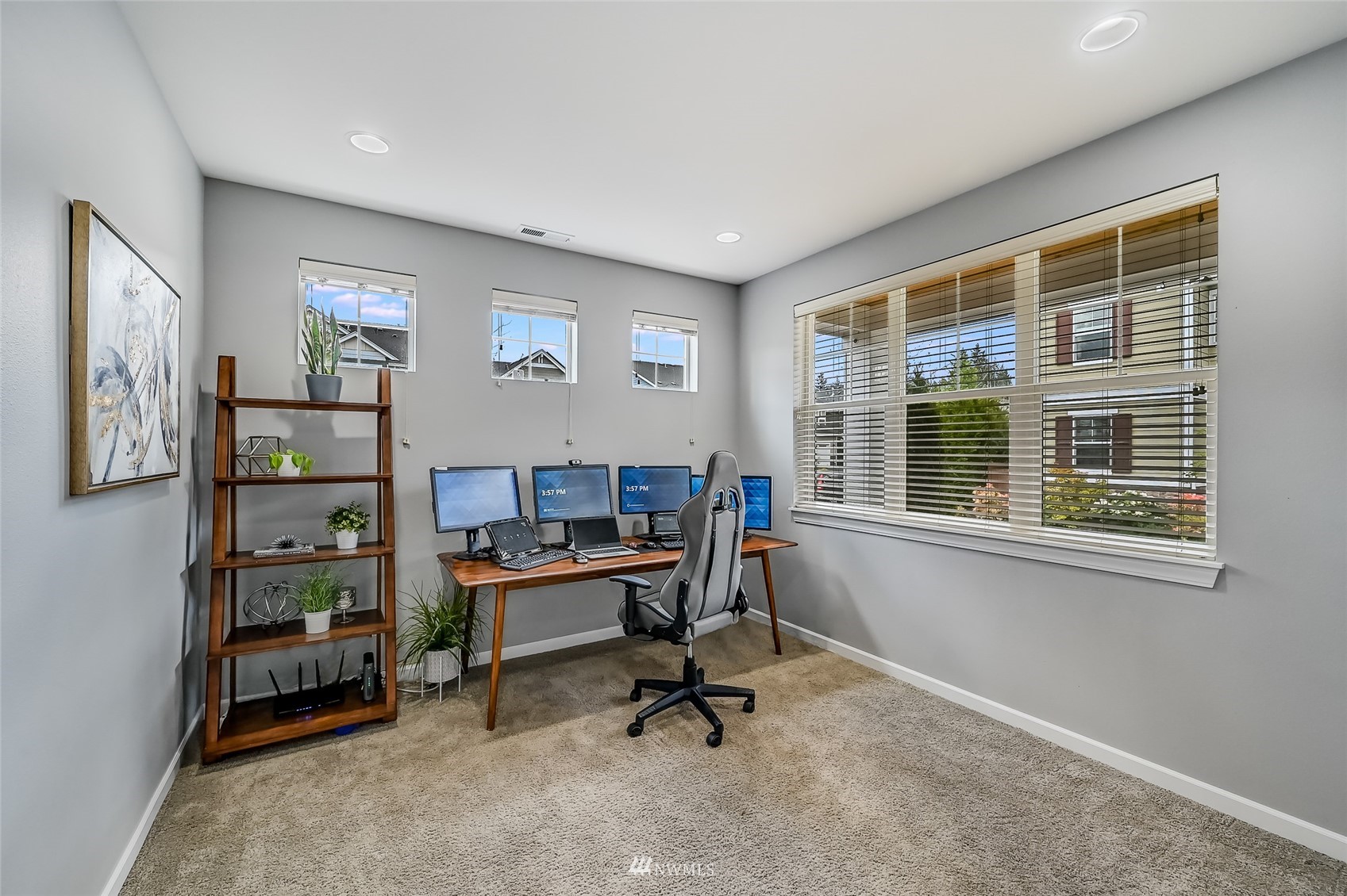 3715 195th Place Southeast Bothell, WA 98012 - Photo 26 of 28 a view of a workspace with furniture and a window