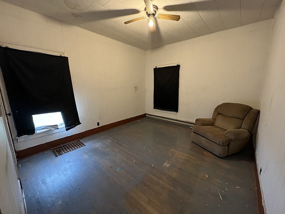 20069 Capp Road Morrison, IL 61270 - Photo 16 of 22 a living room with furniture and a flat screen tv