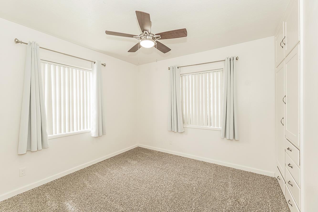 795 West Palm Avenue Reedley, CA 93654 - Photo 14 of 28 a view of an empty room with a window