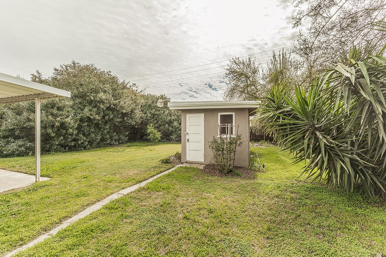 795 West Palm Avenue Reedley, CA 93654 - Photo 21 of 28 a view of a house with a yard