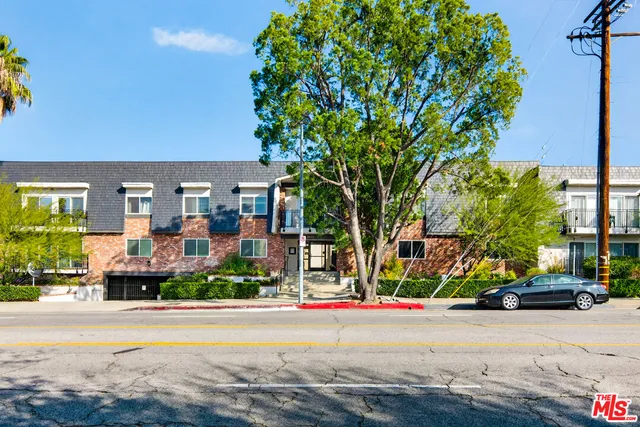 a view of street with houses