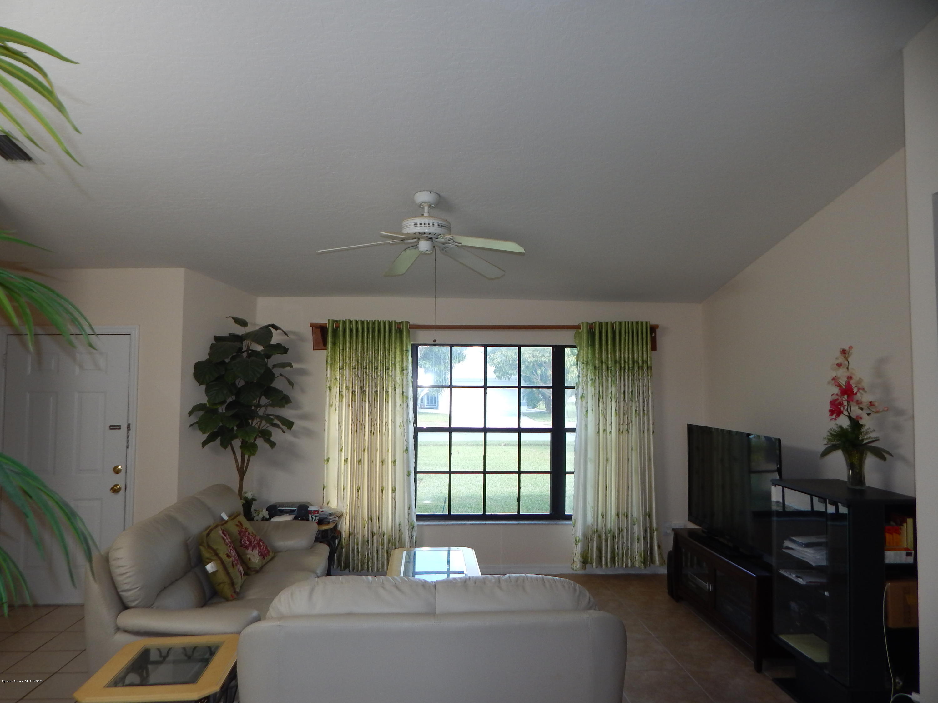1247 Winding Meadows Road Rockledge, FL 32955 - Photo 11 of 23 Family room
