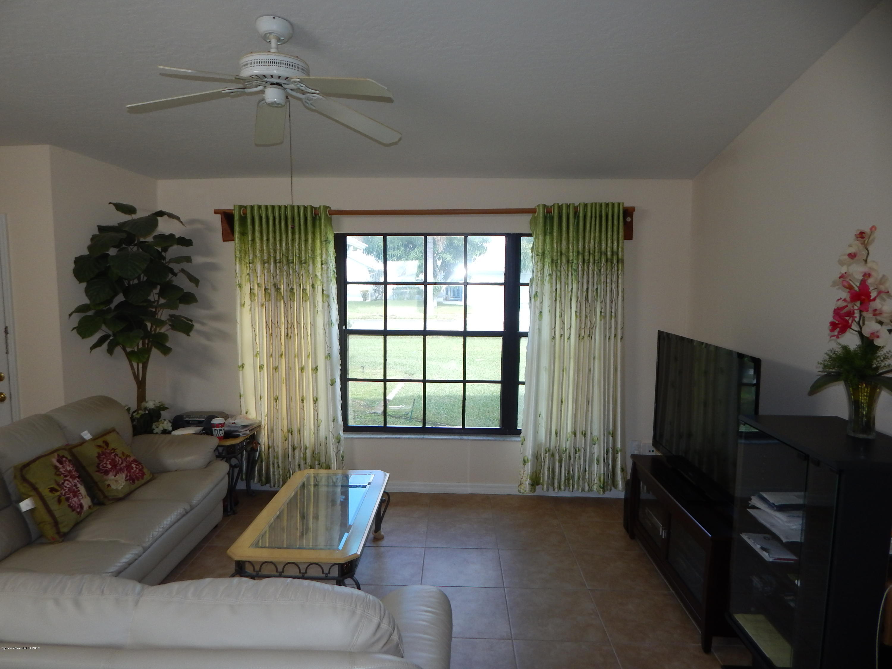 1247 Winding Meadows Road Rockledge, FL 32955 - Photo 12 of 23 Family room