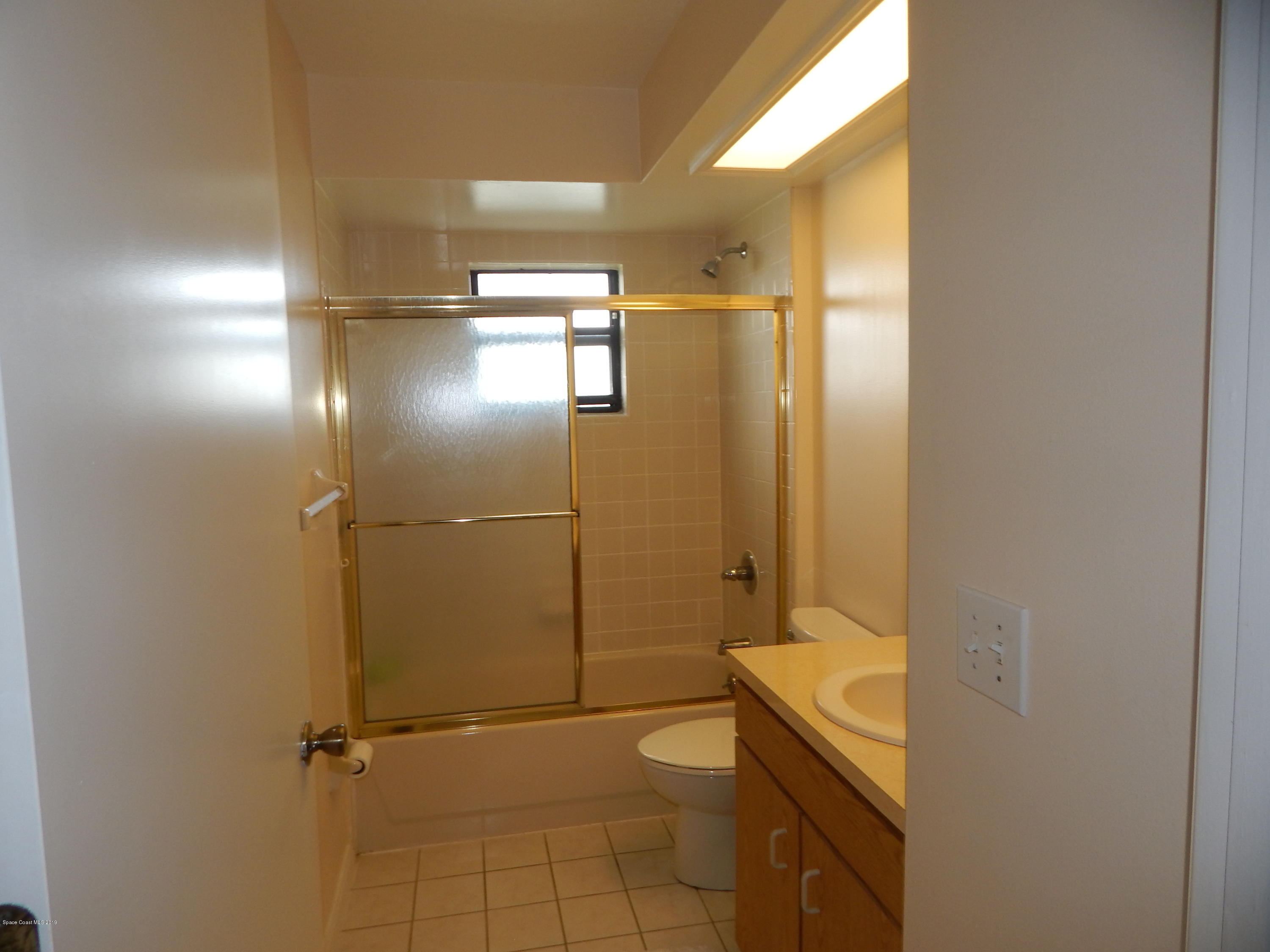 1247 Winding Meadows Road Rockledge, FL 32955 - Photo 18 of 23 Guest bath