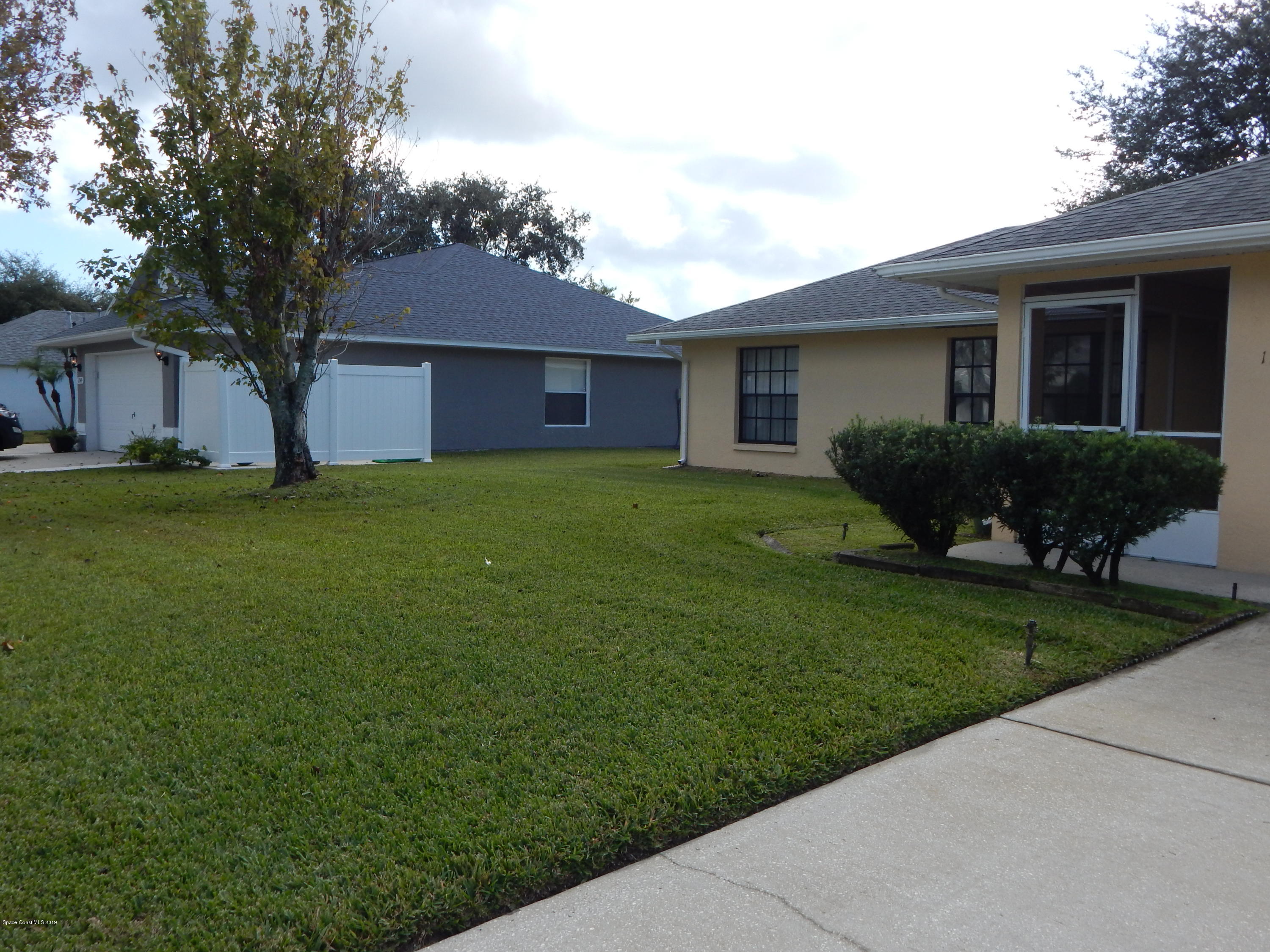 1247 Winding Meadows Road Rockledge, FL 32955 - Photo 3 of 23 Front yard