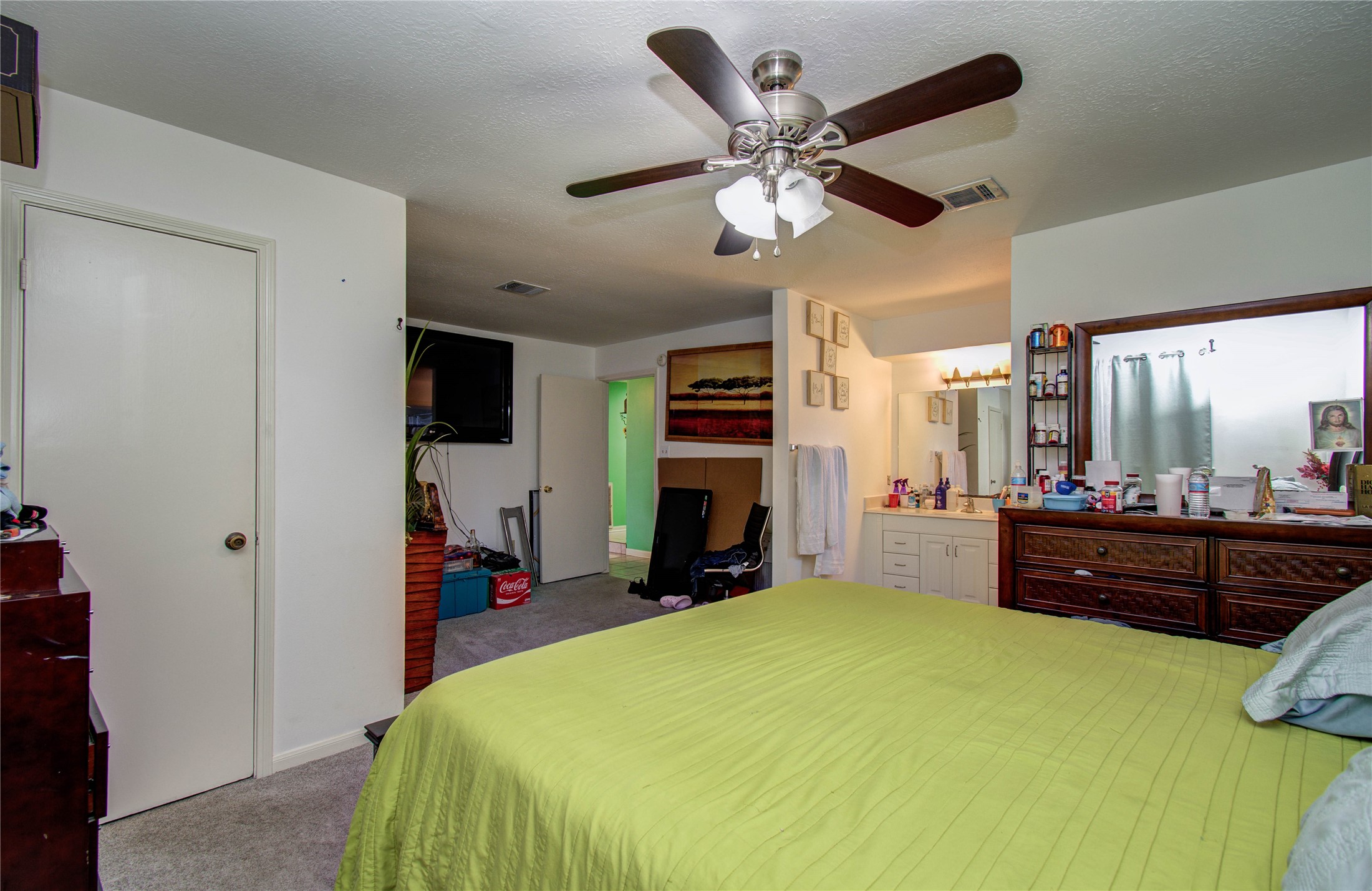 22315 Indian Ridge Drive Katy, TX 77450 - Photo 15 of 29 a bed room with a bed and a mirror
