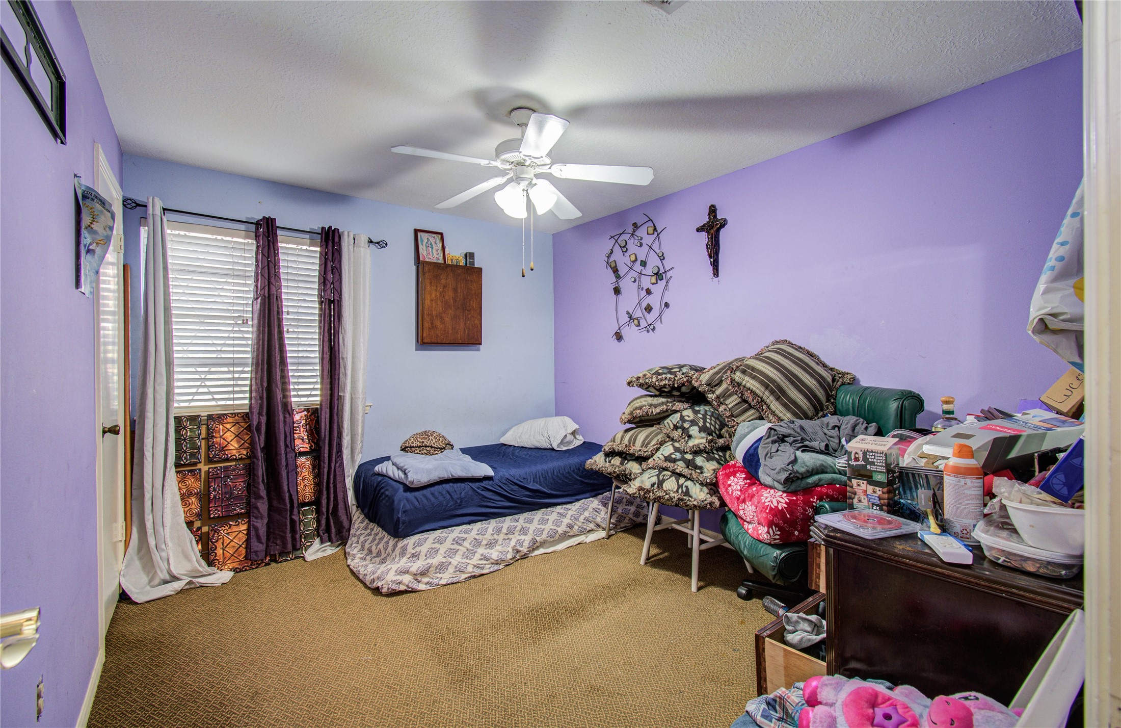 22315 Indian Ridge Drive Katy, TX 77450 - Photo 20 of 29 a bedroom with furniture and a potted plant