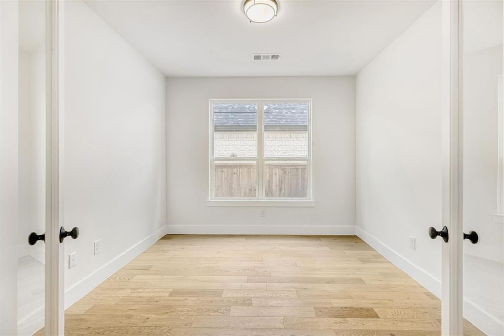 3328 Chinaberry Street Celina, TX 75009 - Photo 9 of 29 an empty room with a window