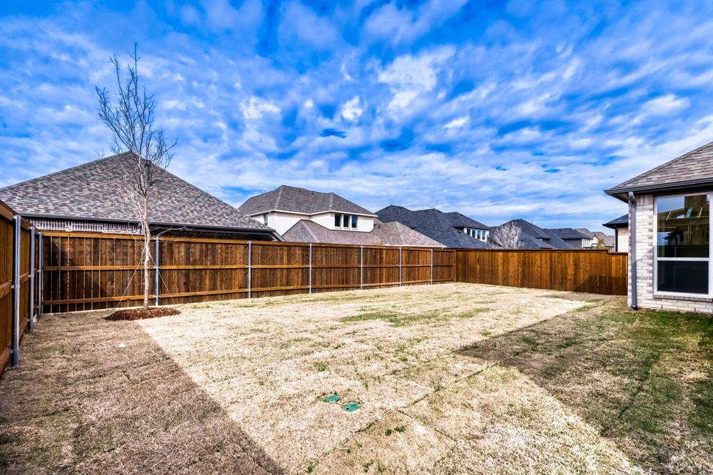 3328 Chinaberry Street Celina, TX 75009 - Photo 27 of 29 a view of roof deck with a yard
