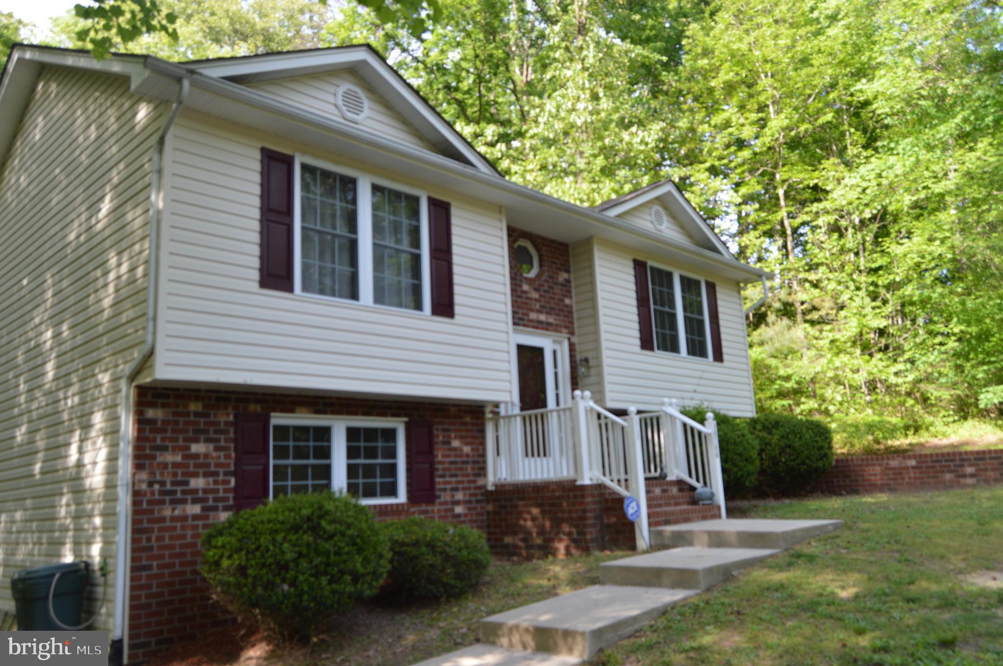 12137 Shortleaf Road Ruther Glen, VA 22546 - Photo 2 of 22 Front with sidewalk