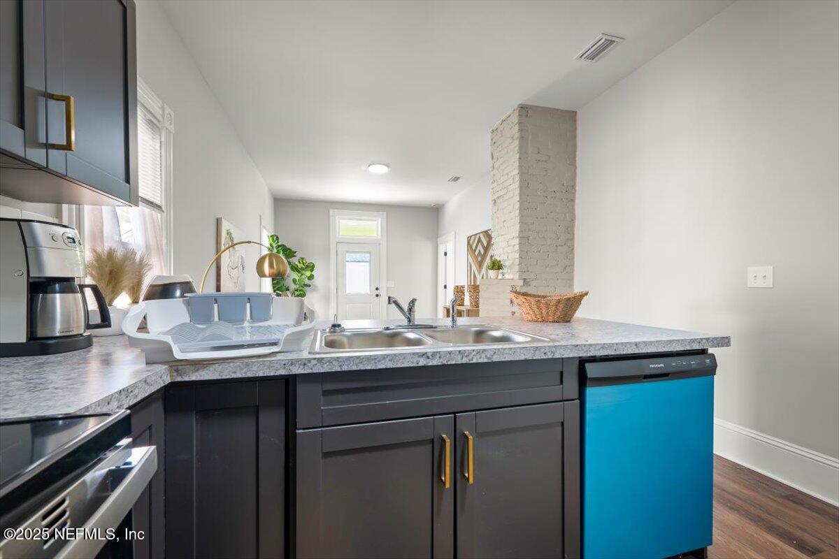 1946 Redell Street Jacksonville, FL 32206 - Photo 15 of 28 a kitchen with a sink and cabinets