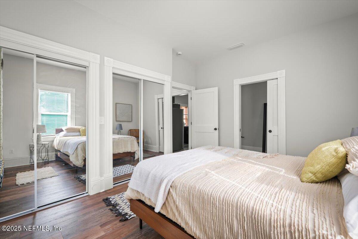 1946 Redell Street Jacksonville, FL 32206 - Photo 25 of 28 a bedroom with a bed and a large mirror