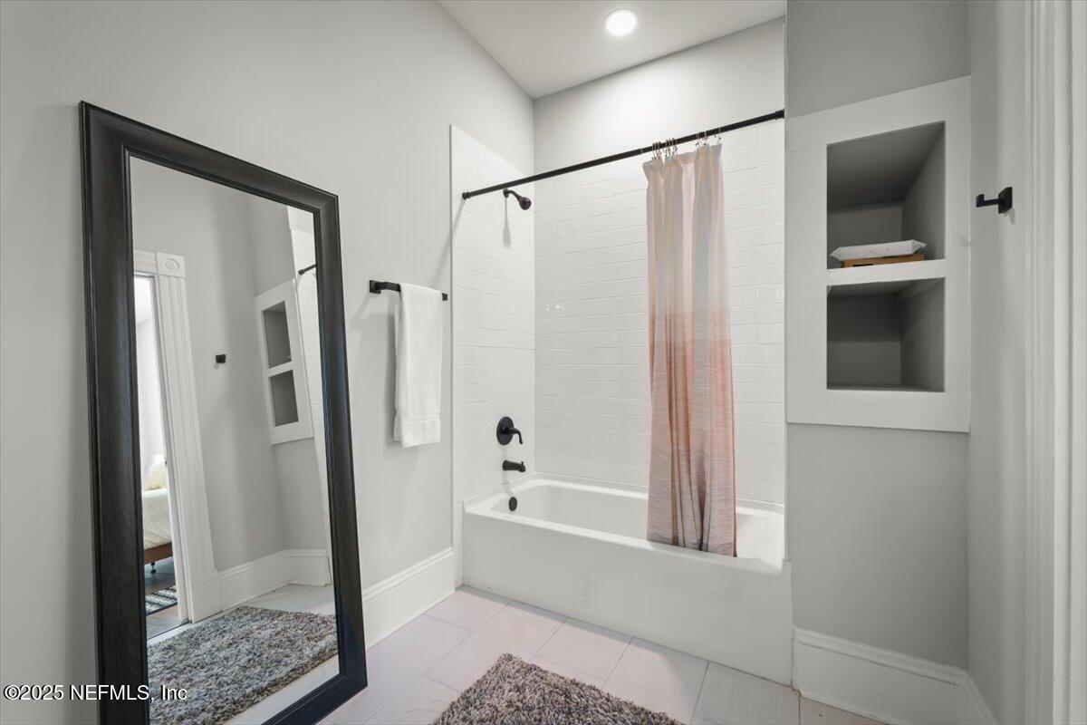 1946 Redell Street Jacksonville, FL 32206 - Photo 27 of 28 a bathroom with a shower and a tub