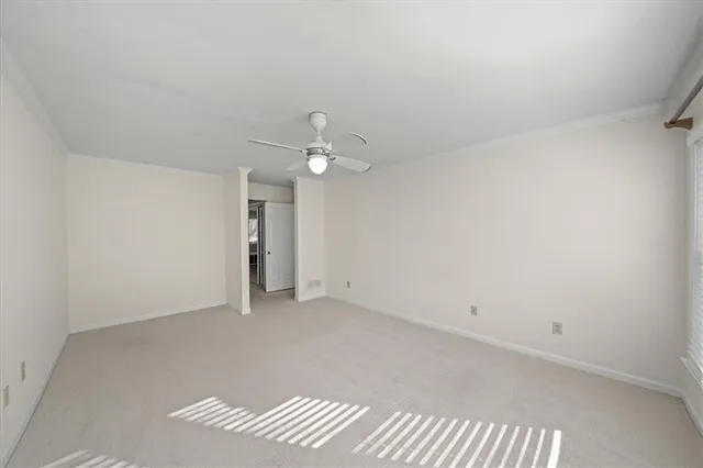 an empty room with a bathroom