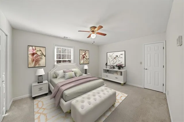 a bedroom with furniture and a chandelier
