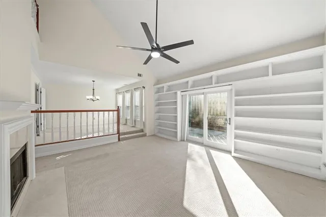 a view of a hallway with stairs